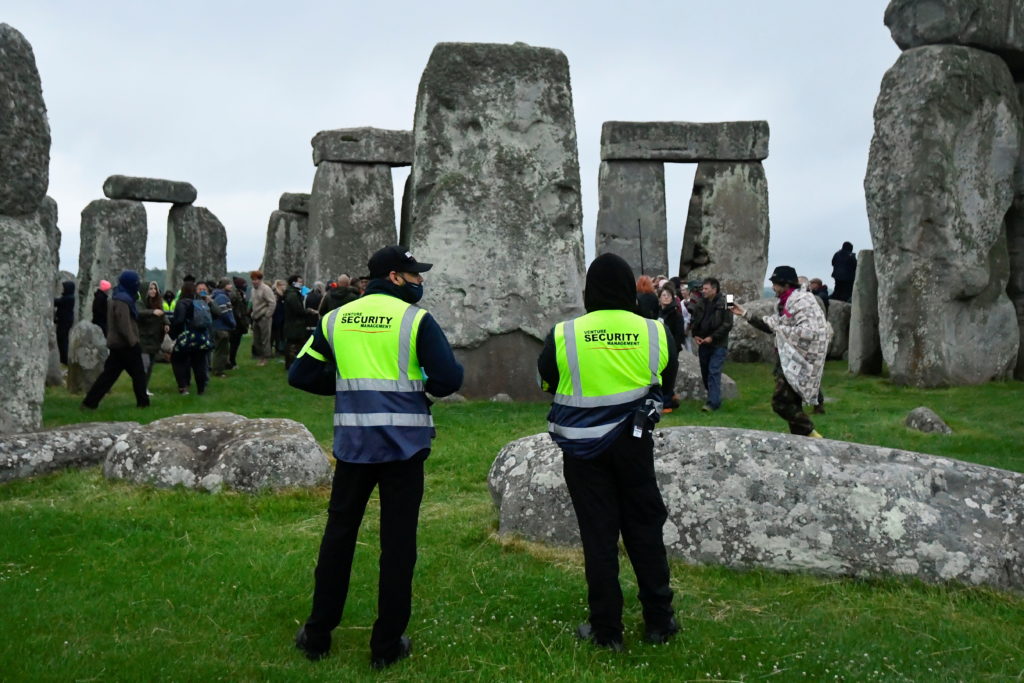 Crowds gather at Stonehenge for summer solstice despite COVID concerns