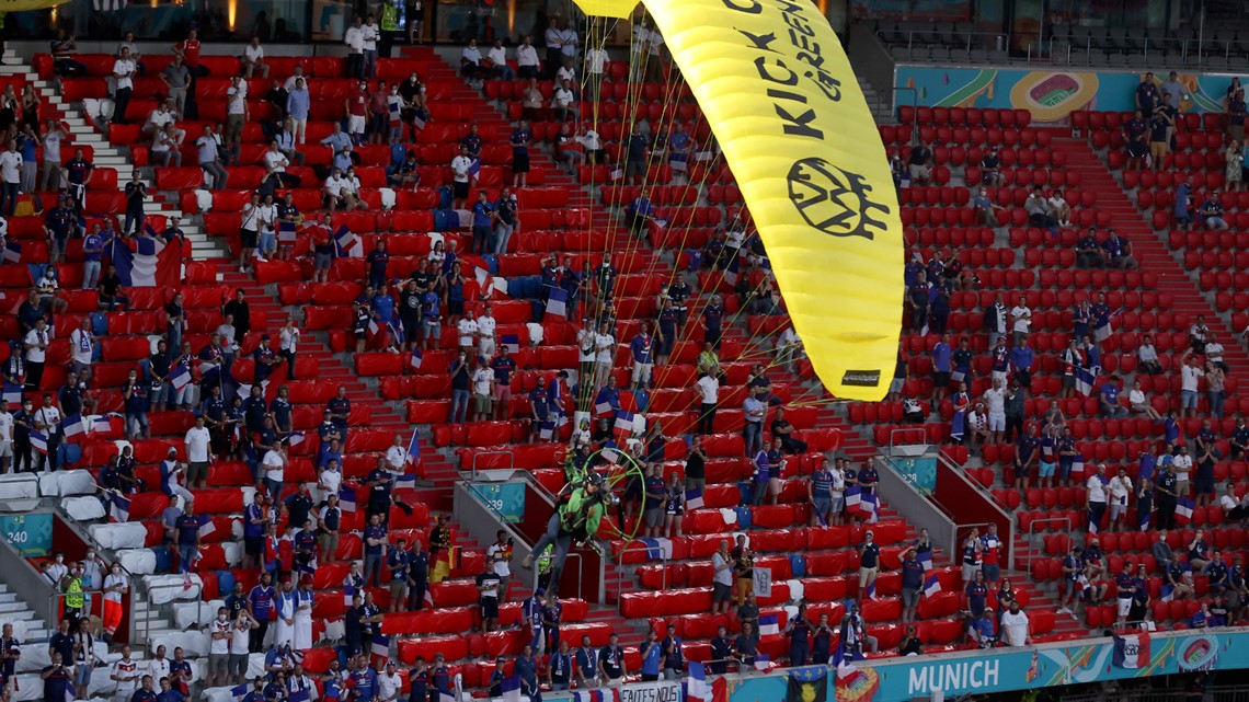 Euro 2020: Greenpeace protestor parachutes into stadium