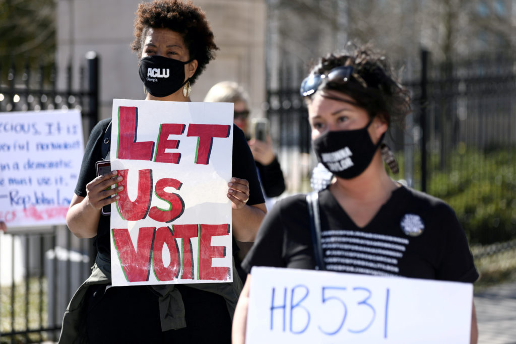 Justice department sues Georgia over state’s new election law