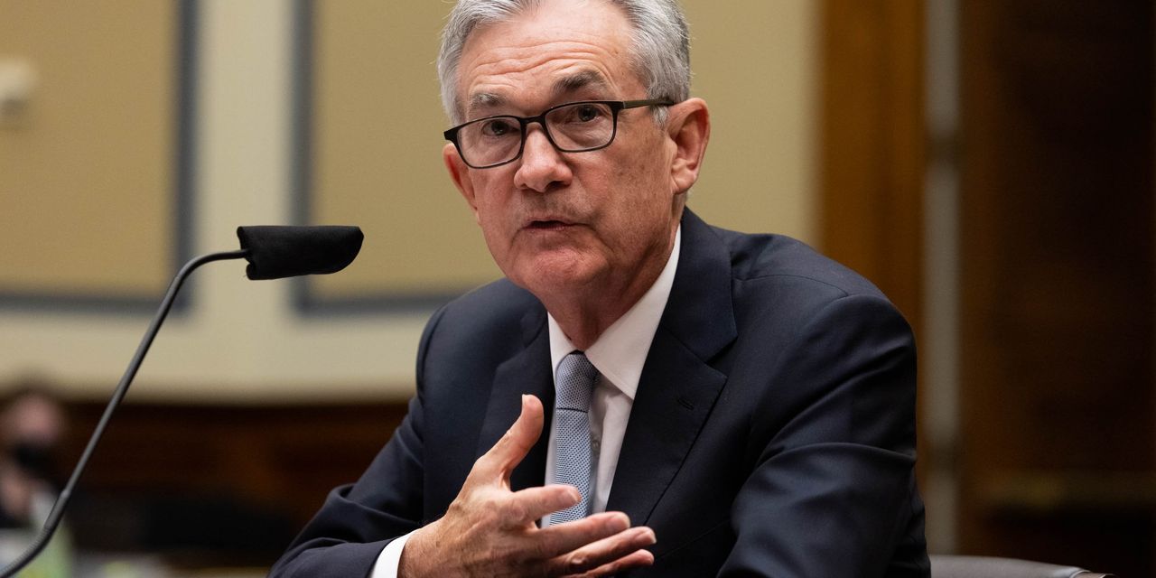 Fed Officials See Earlier End for Bond Buying, Emphasize Patience