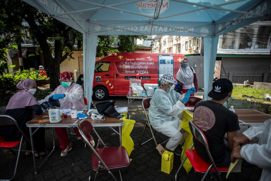 Indonesia reports 54,000 virus cases, becomes Asian hotspot