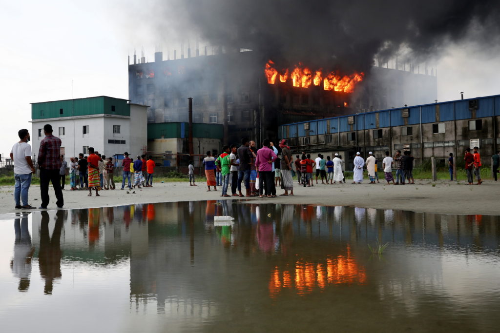 At least 52 people die after fire engulfs a factory in Bangladesh