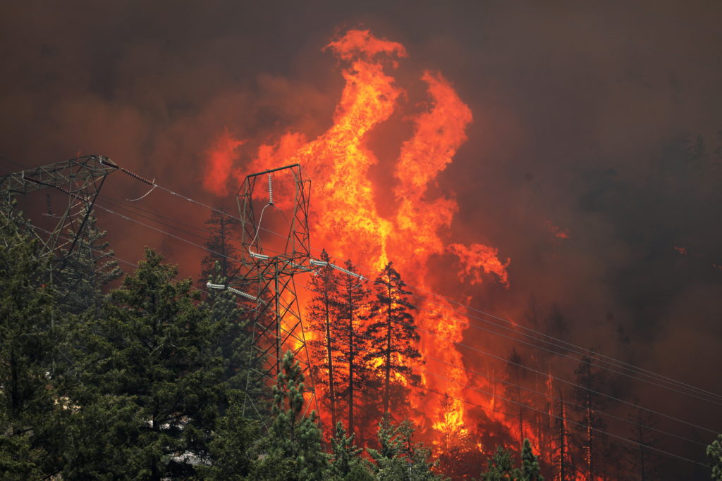 Wildfires are increasing health risks of already-polluted regions of the U.S., experts warn