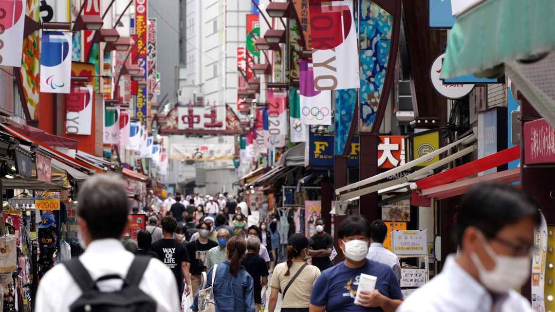 Japan expands COVID emergency after record spikes amid Olympics