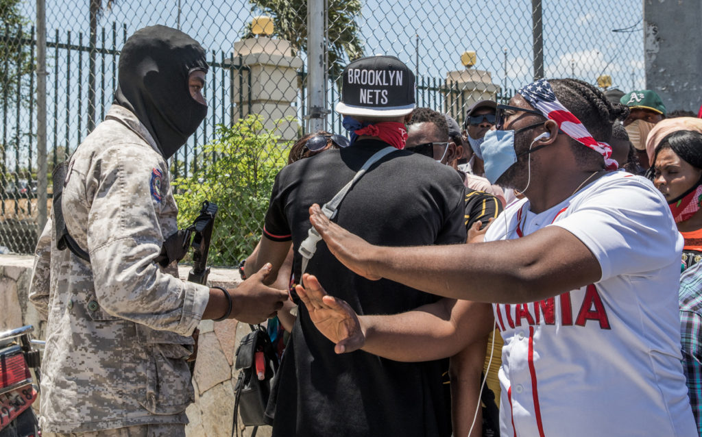 ‘We need help’: Haiti’s interim leader requests US troops