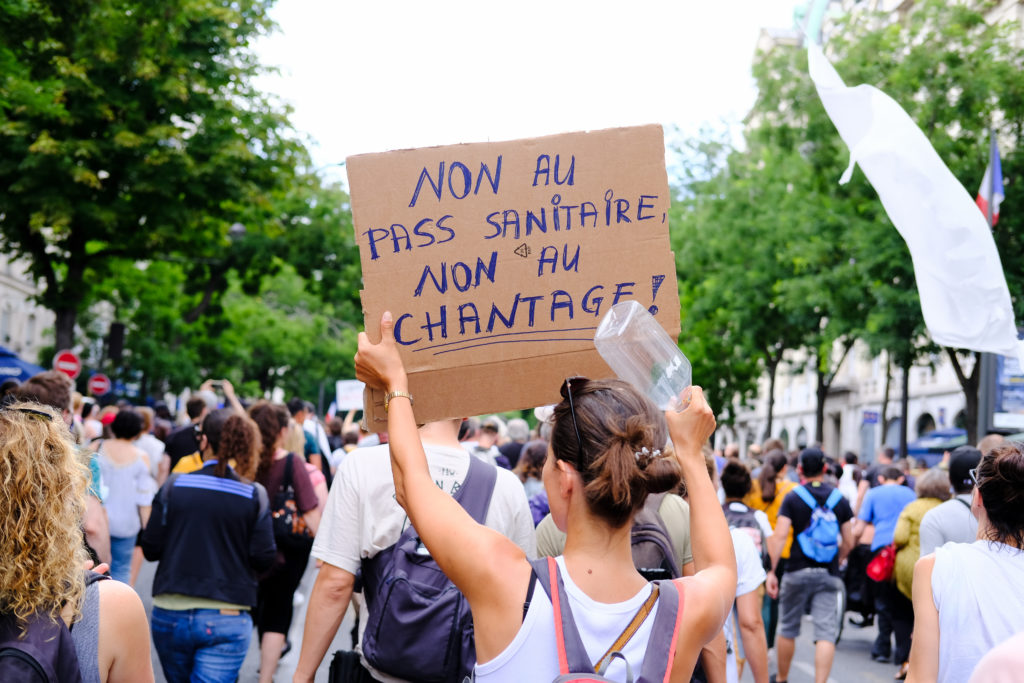 French protesters reject virus passes, vaccine mandate