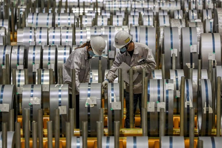 China’s industrial profit growth slows in June on high raw material prices, Economy News & Top Stories