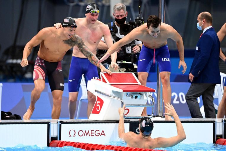 Olympics: American swim star Caeleb Dressel leads team to victory in 4x100m freestyle relay, Sport News & Top Stories