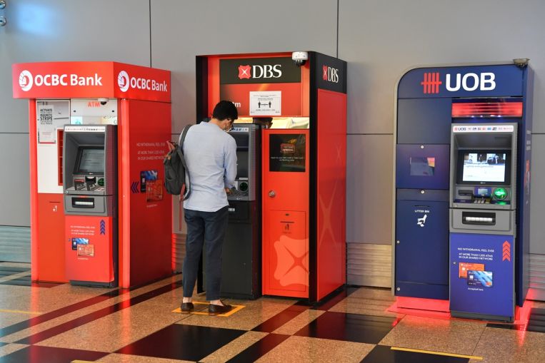 Singapore banks’ shares surge after MAS lifts dividend cap; higher payouts expected, Companies & Markets News & Top Stories