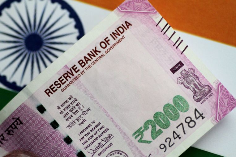 Rupee slides towards year’s low as India’s trade deficit widens, Banking News & Top Stories