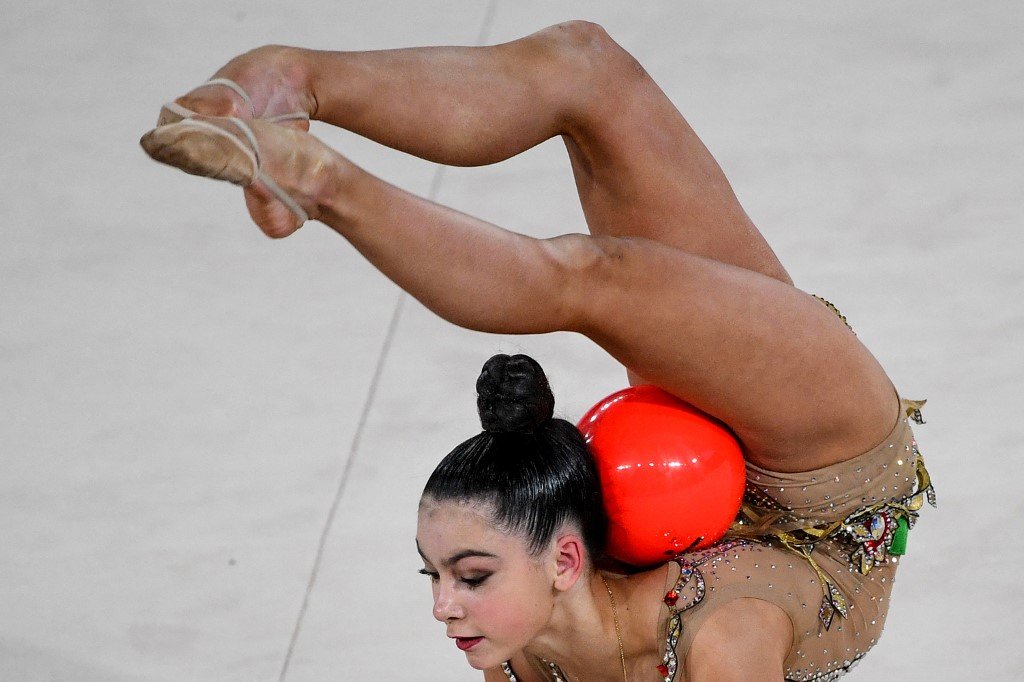 Bloody noses and back surgeries: rhythmic gymnasts pay high price to compete