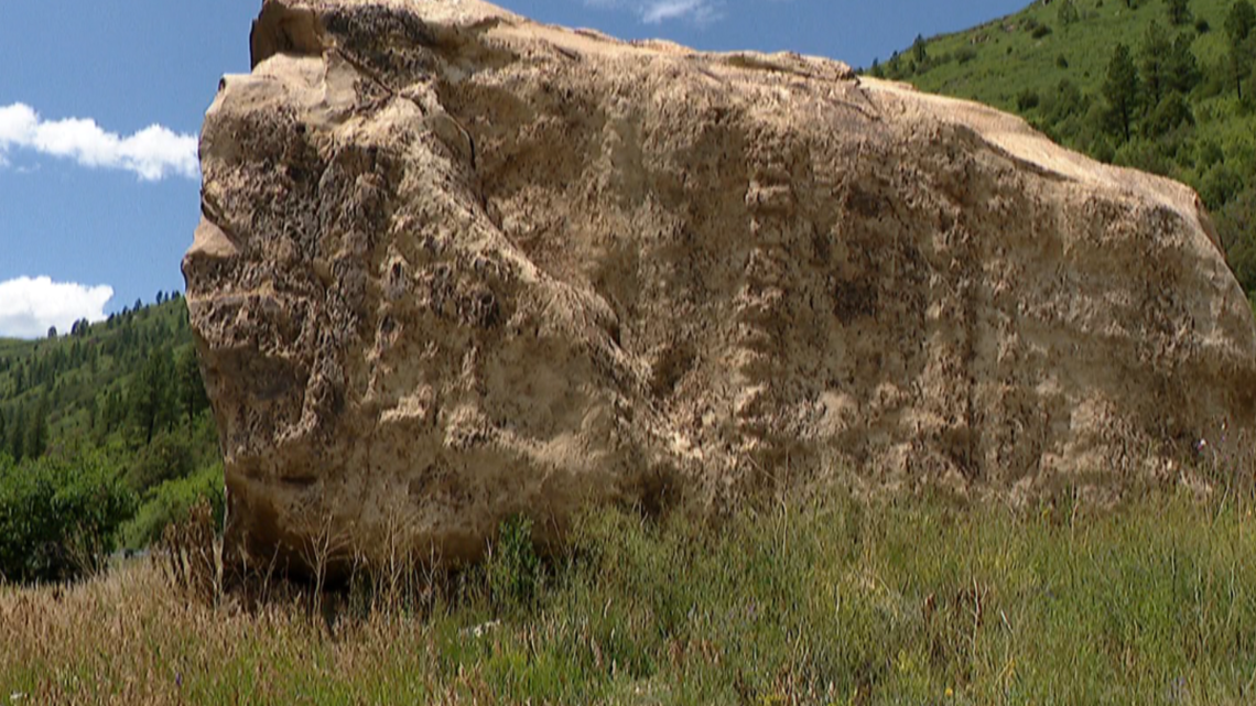 A fallen boulder becomes a tourist attraction in Dolores