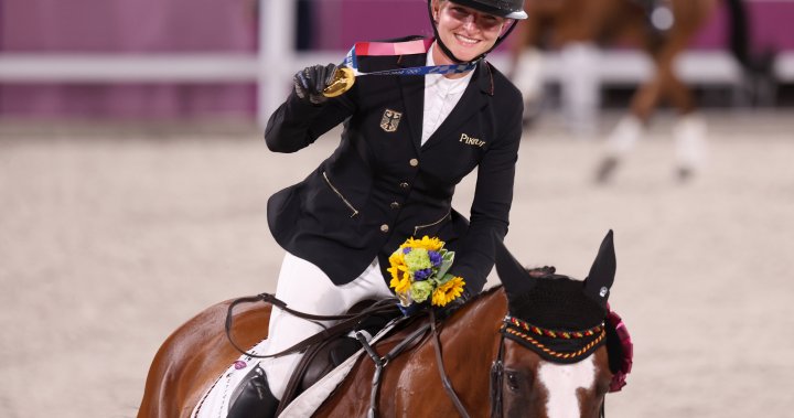 Germany’s Julia Krajewski becomes first female Olympic champion in equestrian eventing – National
