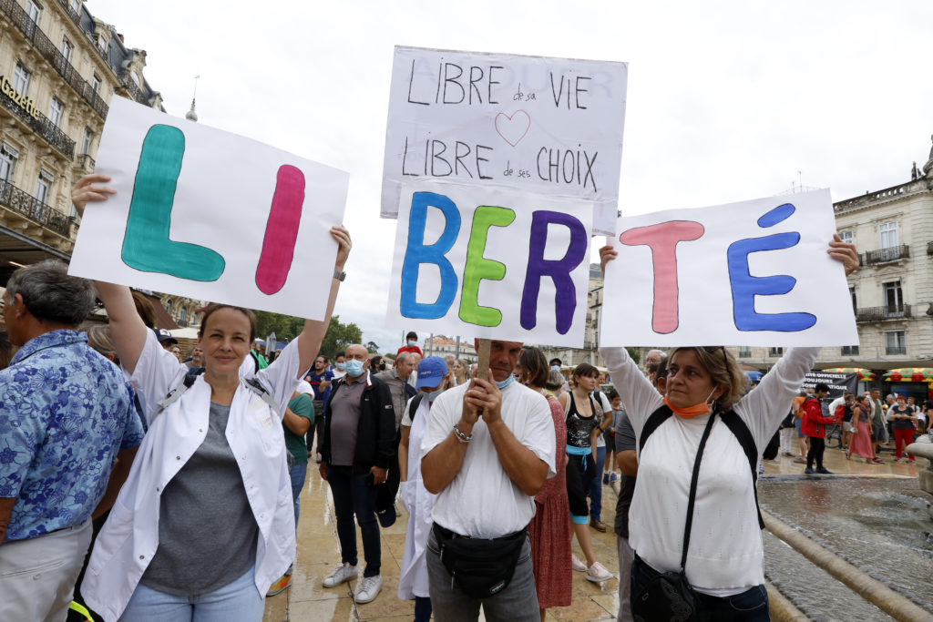 For 4th week, protesters in France decry virus pass rules