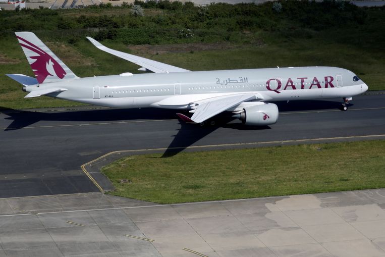 Qatar Airways says regulator grounds 13 of its Airbus A350s over surface issue, Business News & Top Stories