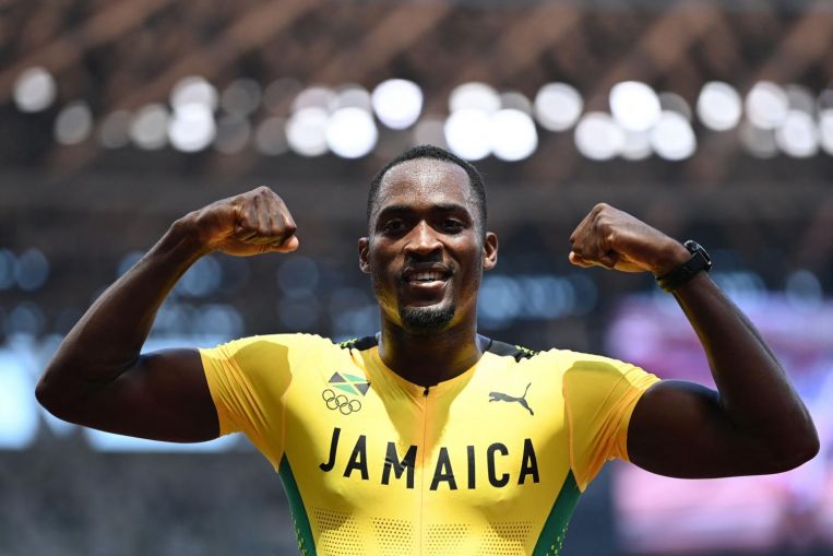 Olympics: Jamaican Parchment shocks Holloway of the US to win 110m hurdles, Sport News & Top Stories