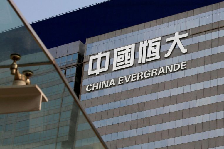 Evergrande cut by Moody’s, faces another asset freeze petition, Companies & Markets News & Top Stories