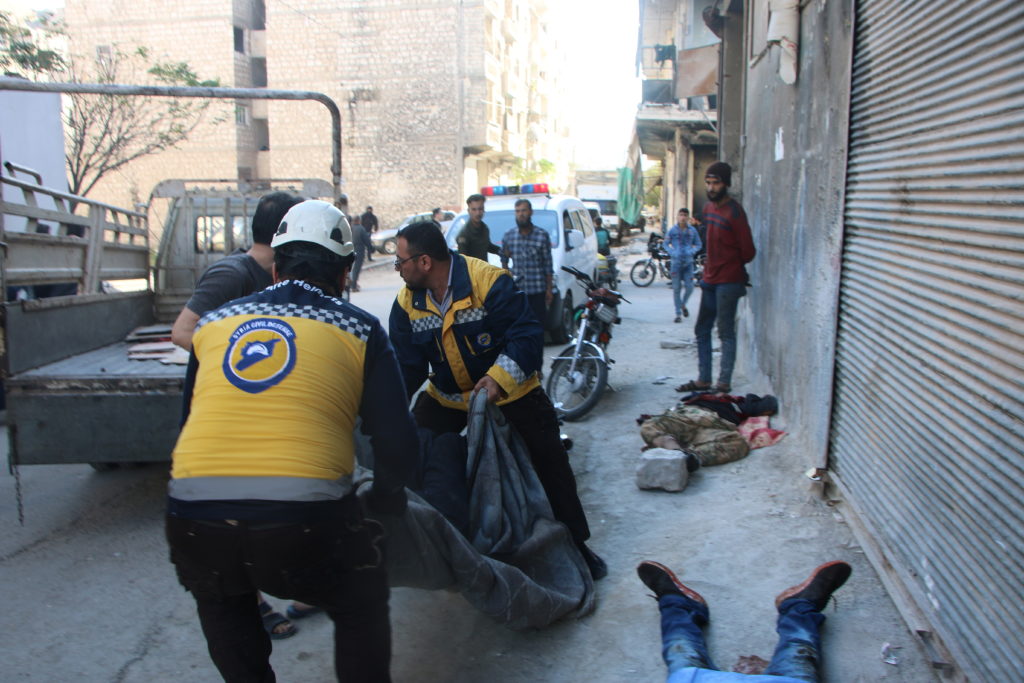 Bus bombs kill 14 in Syria capital; shells elsewhere kill 10