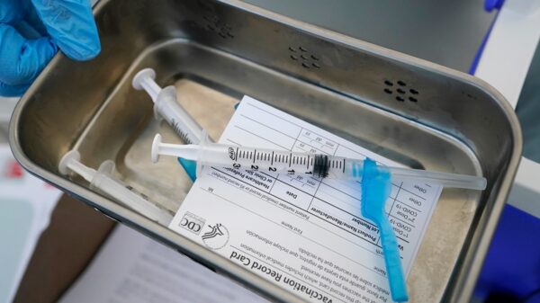 Vaccine-or-testing mandate fine print expected any day