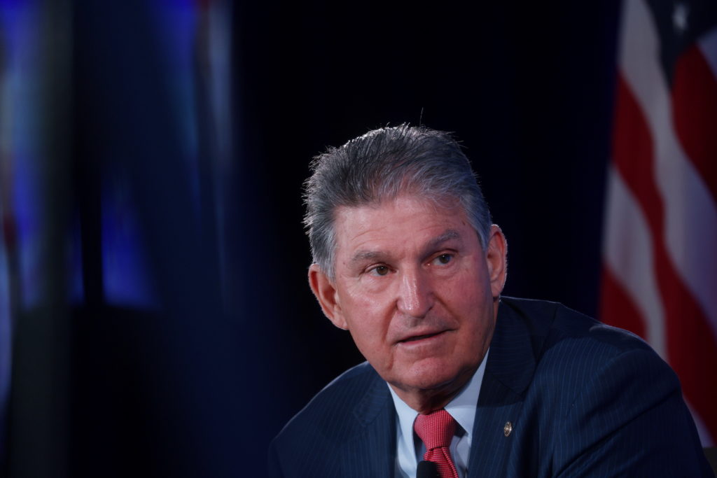 Paid family leave, billionaire tax likely cut from spending bill over Manchin opposition