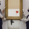 Shredded Banksy artwork sells for record amount at auction