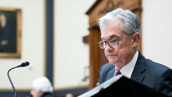 Fed Dials Back Bond Purchases, Plots End to Stimulus by June