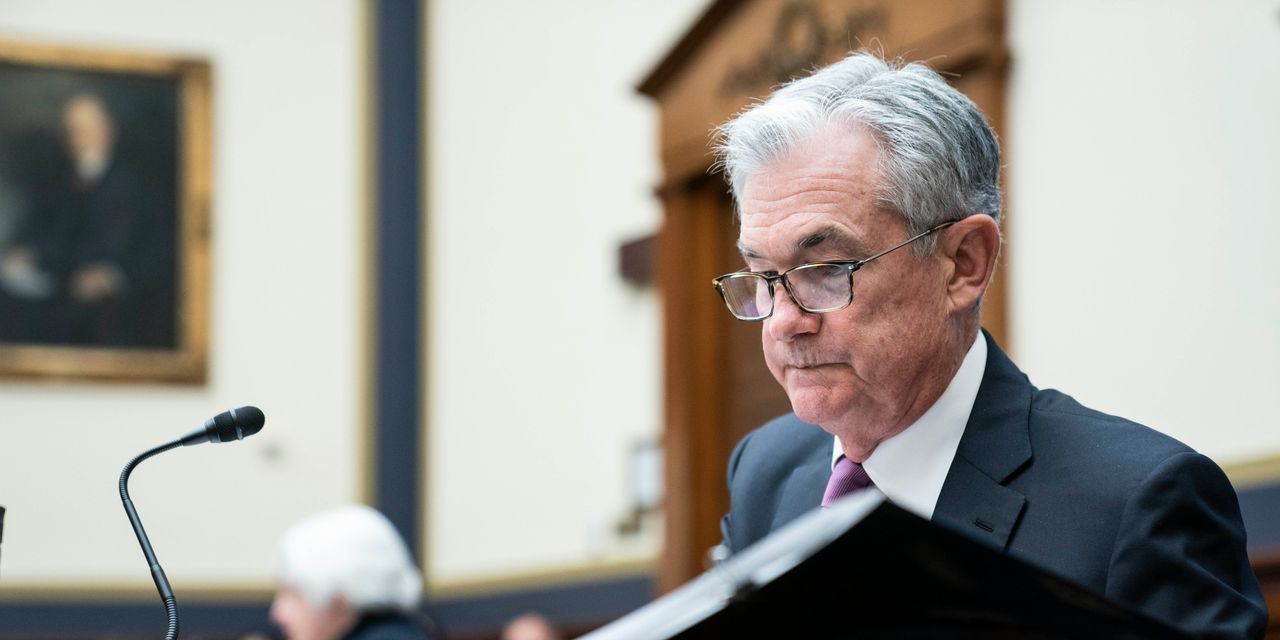 Fed Dials Back Bond Purchases, Plots End to Stimulus by June