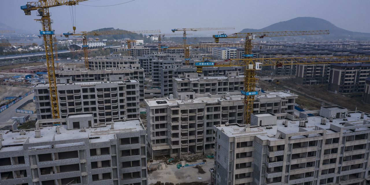 Chinese Developers Rally on Policy Hopes as Evergrande Again Averts Default