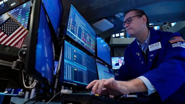 Stock Futures Slip Ahead of Earnings and Manufacturing Data