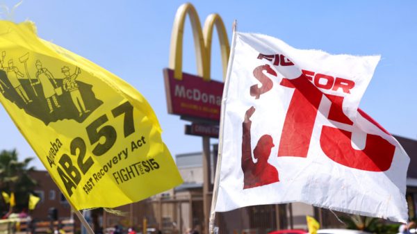 Low wage, essential workers demand better protections in California