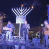 Olde City Arvada menorah lighting honors Officer Beesley, good Samaritan Hurley