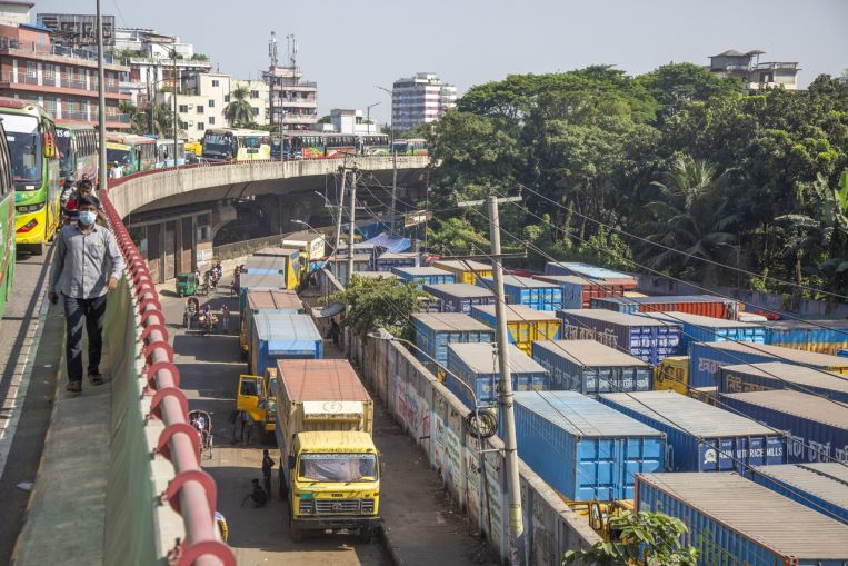 Striking truckers in Asia threaten to add to supply chain snarls, Economy News & Top Stories