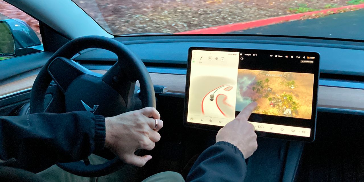 Tesla’s Contact-Display screen Gaming Probed by U.S. Auto-Security Regulator