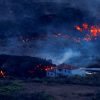 Volcanic lava imperils church, properties on Spain’s La Palma island