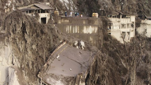 Indonesian rescuers dig by means of volcanic ash after 14 die