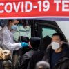 U.S. faces double coronavirus surge as omicron variant spreads