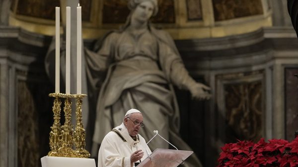 Pope celebrates Christmas Eve Mass as virus surges in Italy