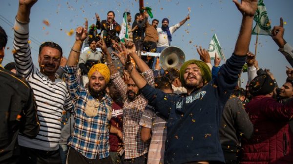 Jubilant Indian farmers start return dwelling following yearlong protests – Nationwide