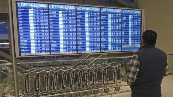 Omicron COVID-19 variant disrupts vacation journey with over 6,000 flights cancelled – Nationwide