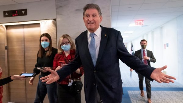 Manchin wavering on  trillion invoice, casting doubt on timeline