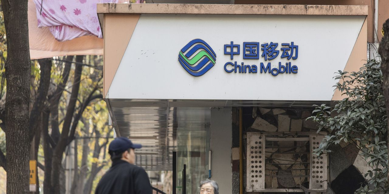 China Cellular Makes Debut in Shanghai After  Billion Inventory Sale