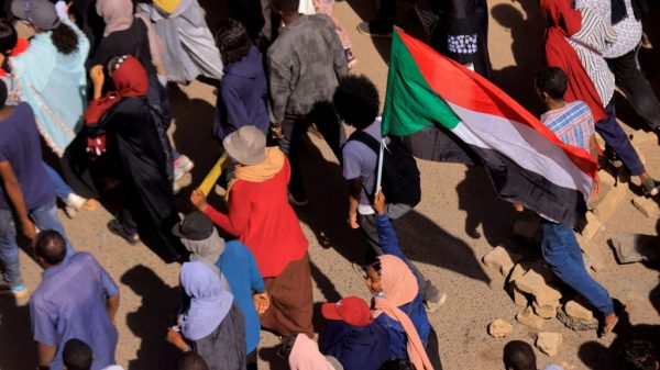 Anti-coup protests in Sudan proceed as prime minister resigns