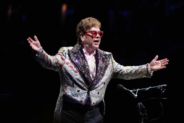 Elton John optimistic for Covid-19, postpones Dallas exhibits