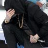 Eminem takes a knee throughout Tremendous Bowl halftime present