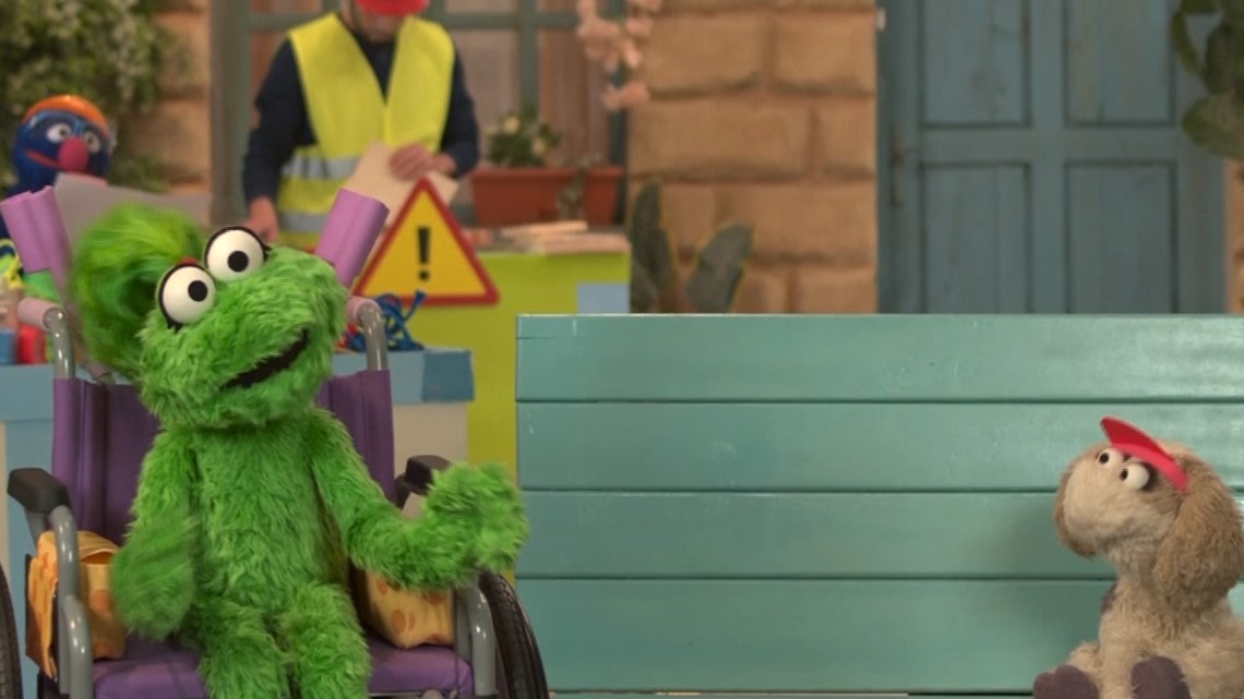 Sesame Avenue: New Muppet Ameera makes use of wheelchair, crutches
